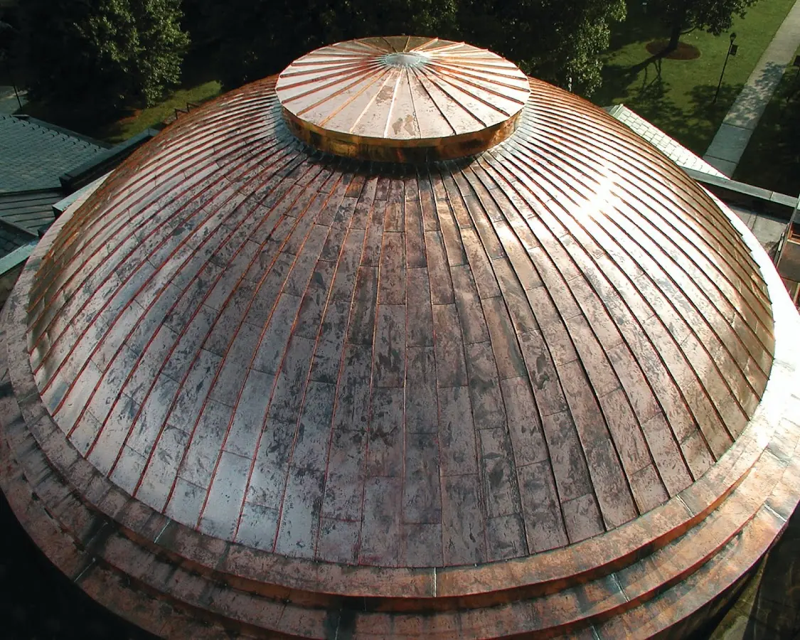 Craftsman Roofing crew installing a new roof in Welch Village